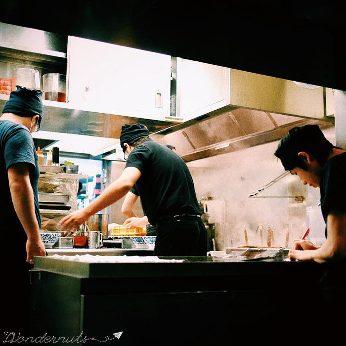 Lots o' hands in this kitchen. Lots of roles to make that bowl of ramen.